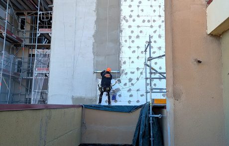 Installing graphite EPS boards of the ETICS system on the roof in Can Vilardell