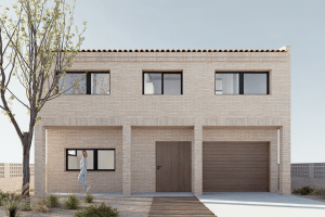 Vista frontal de la fachada de obra vista con columnas de obra