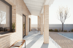 Porche con columnas de obra vista